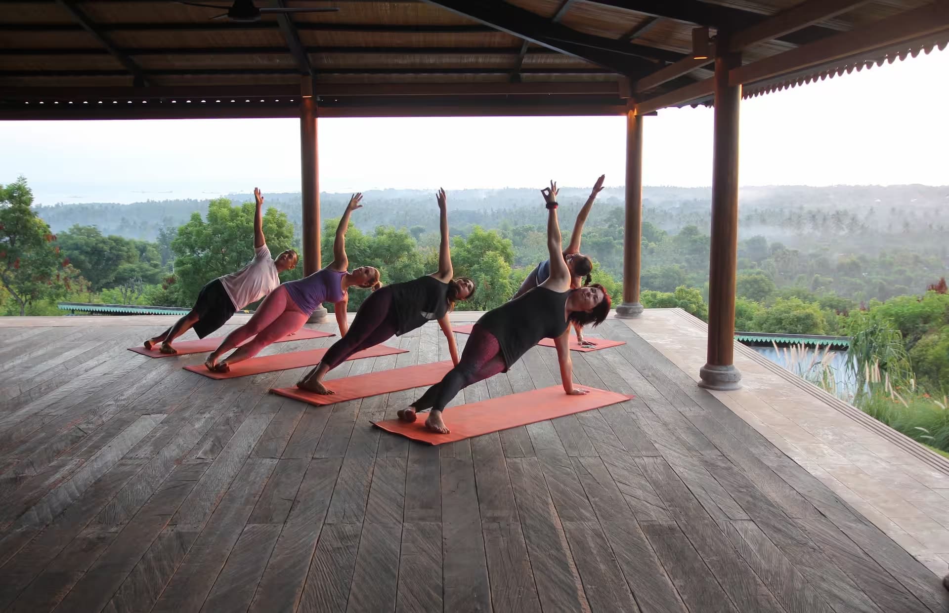 Yoga retreat group session with international teachers