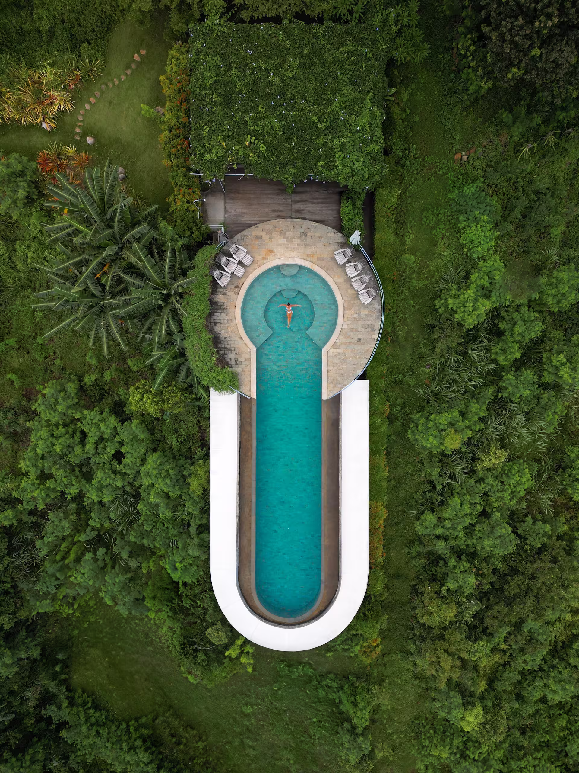 Aerial view showcasing the infinity edge effect with endless valley views