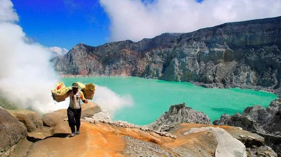 Ijen Crater volcano hike with stunning volcanic landscapes and sulfur mining views