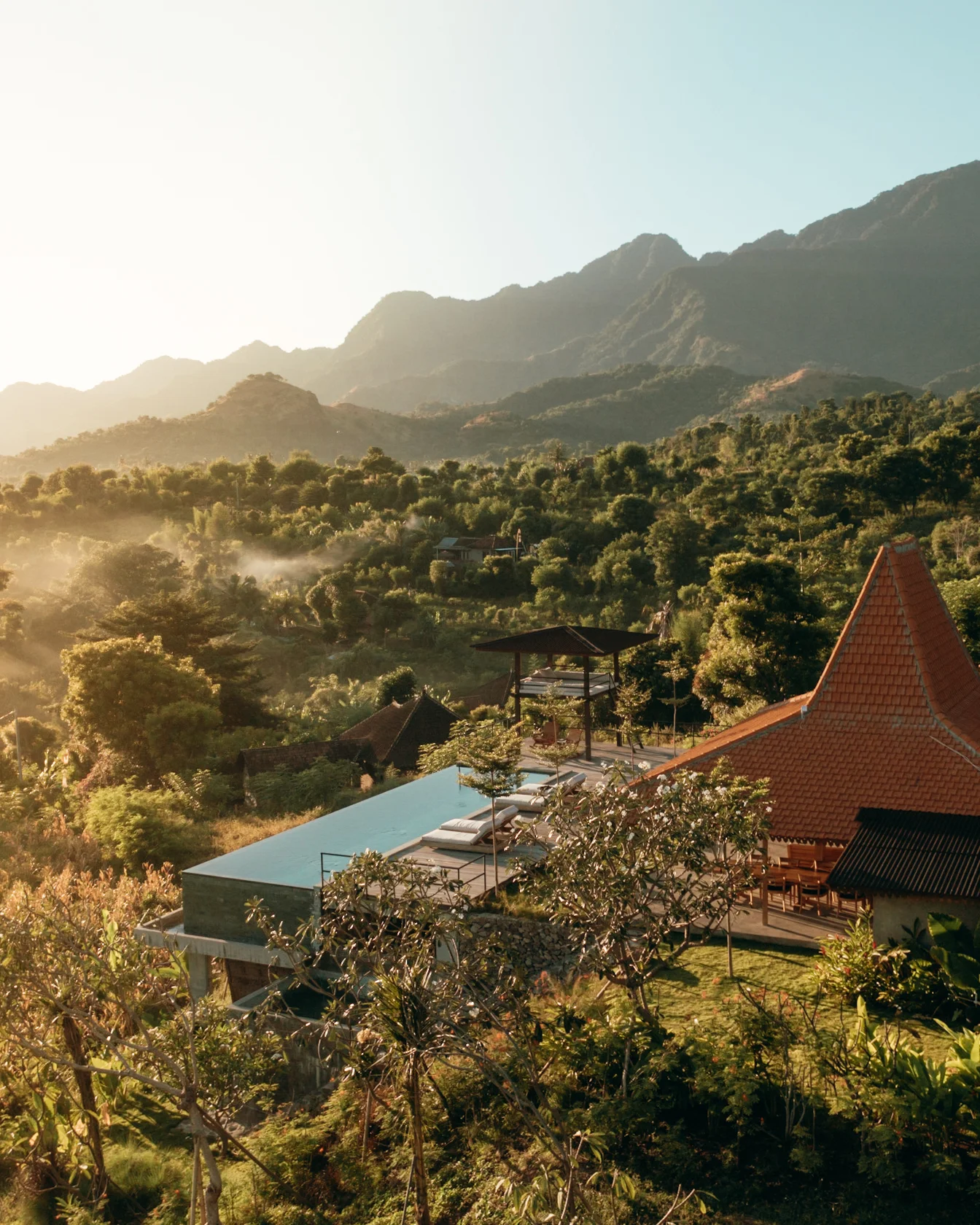 Villa Jahe exterior with lush gardens and modern design