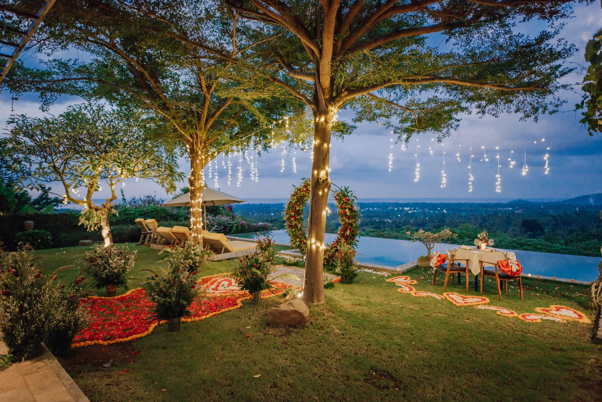 Romantic dinner setup with flowers and candles