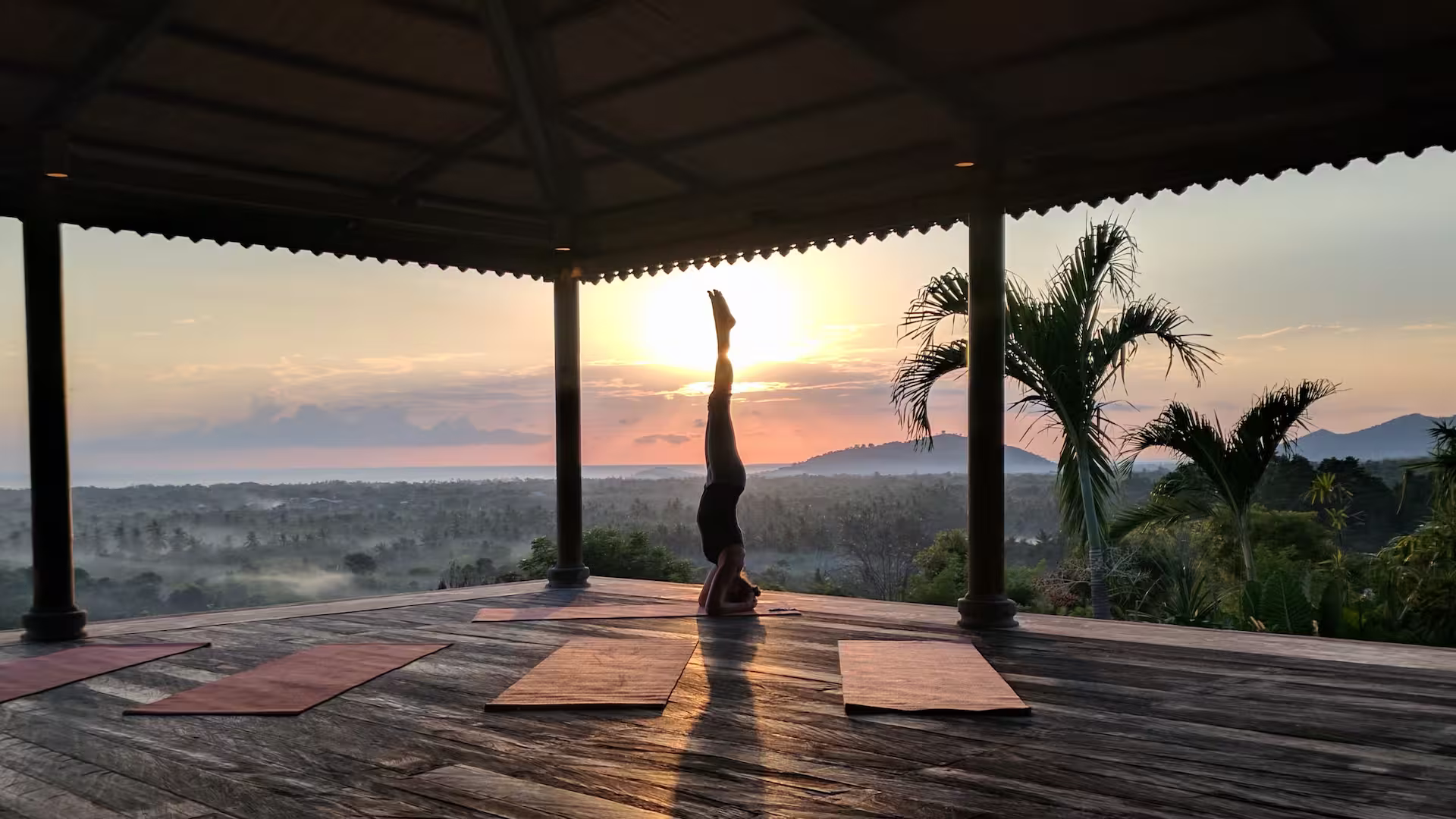 Peaceful yoga pavilion with ocean views at golden hour