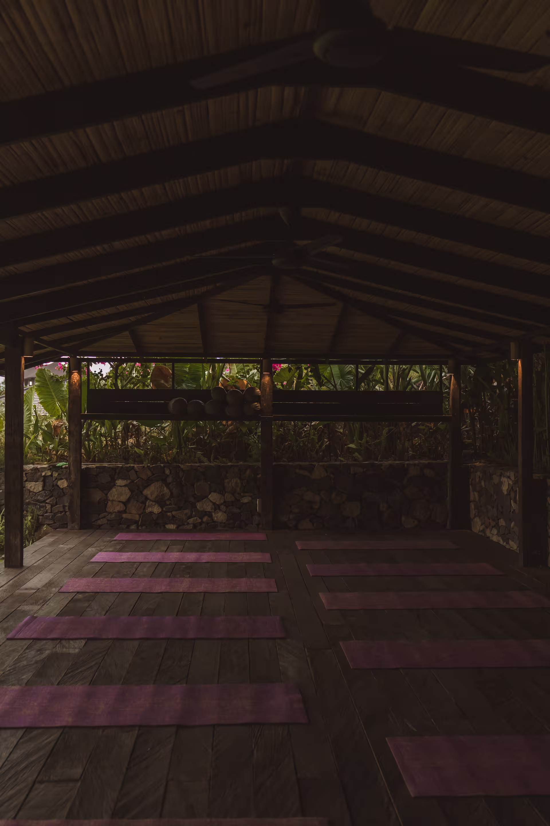 Spacious indoor yoga studio with natural lighting